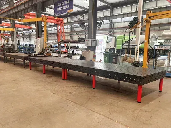Long fabricated steel 3D welding platform with machined hole grid